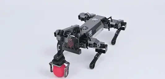 XGO Robot Dog with claw picking up the ball